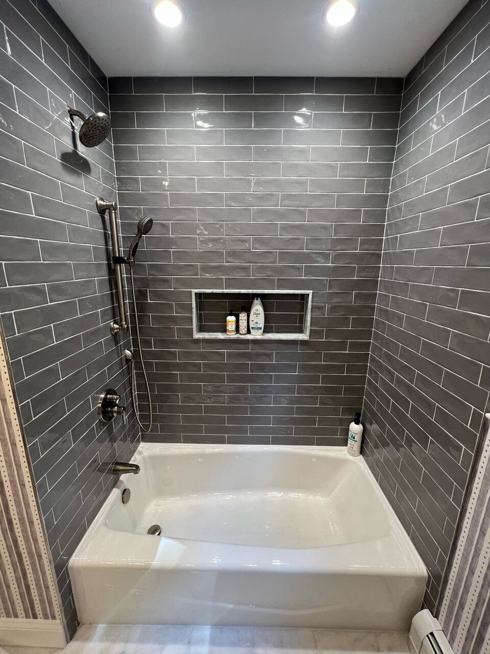 Gray tiled shower and tub surround